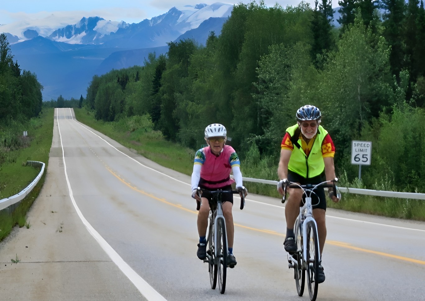 Bicyclist riding along AlCan Highway