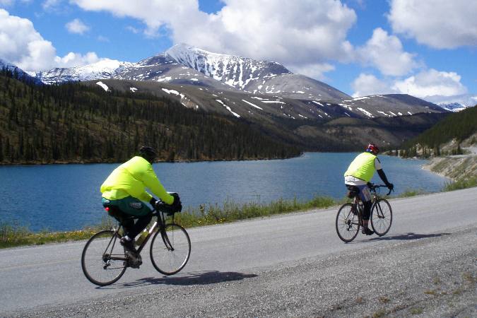 bicyclists-passing-lake-along-Al-Can