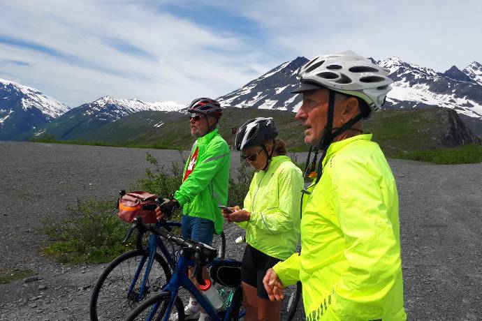 bicyclists at the top of Thompson Pass