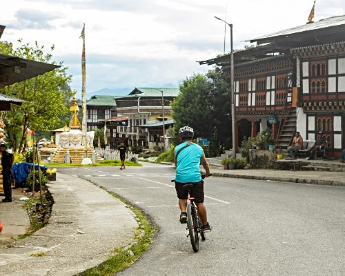 cyclist in rural Bhutan village