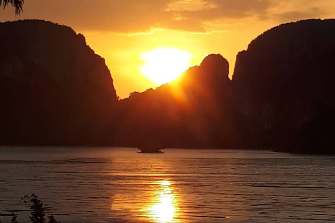 sunset over the water of Phang Nga Bay