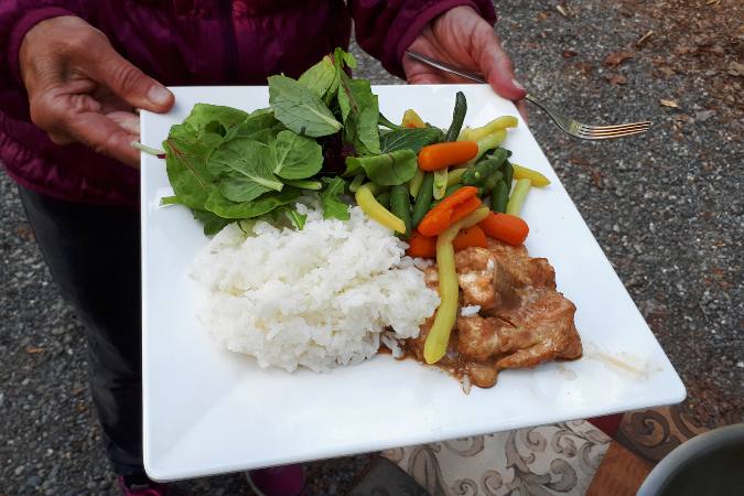 dinner of marinated pork, salad, vegies