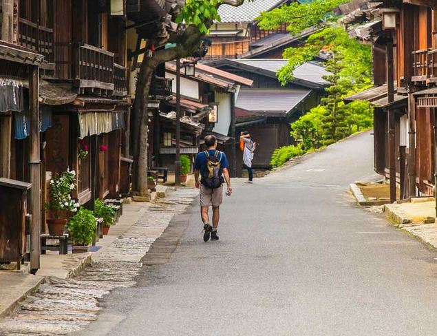 Walking tours in Japan, Nepal, Bhutan hikers in historic village in Japan