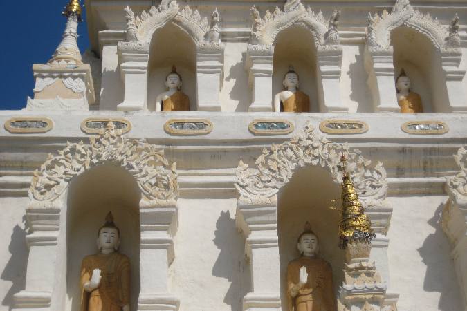 Buddha images in porticos on stupha