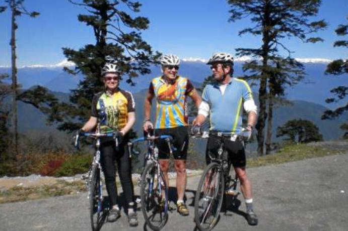 bicyclists on quiet Bhutan road