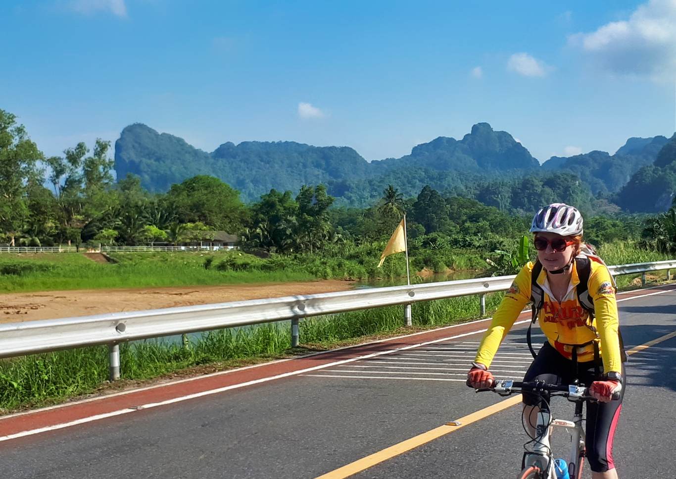 bicyclist enjoying the karst landscapes