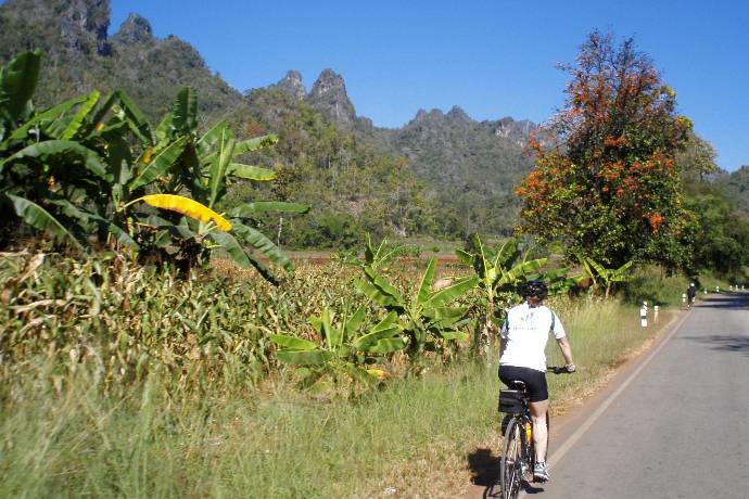 bicycling past farms and karst mountains