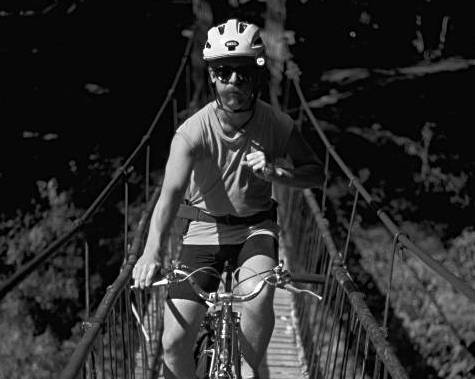 cyclist of swinging bridge
